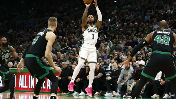  Milwaukee Bucks guard Damian Lillard (0) shoots against the Boston Celtics 